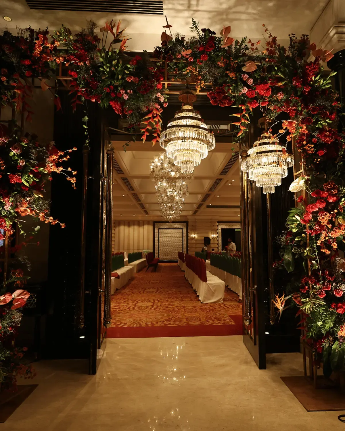 Enchanted garden theme event with suspended lights and botanical installations